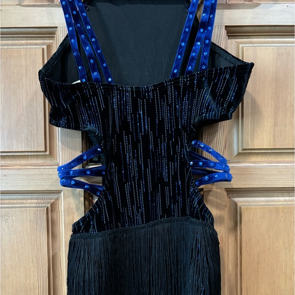 Leotard with cut outs and fringe skirt. - Picture 5 of 6